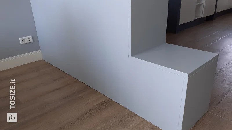 A homemade room divider cabinet made of MDF with Ikea cabinets as a base, by Arjan