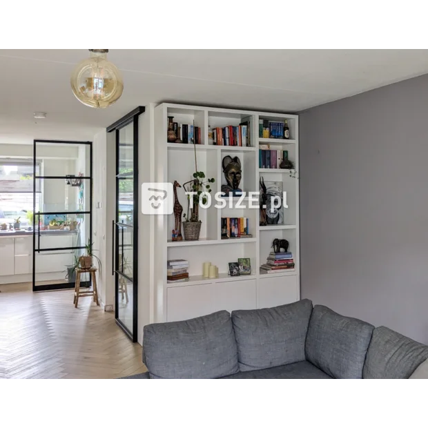 White cupboard wall with open compartments and doors