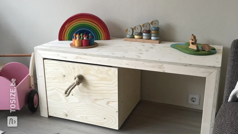 A children's play table custom-made from Finnish spruce, by Ans