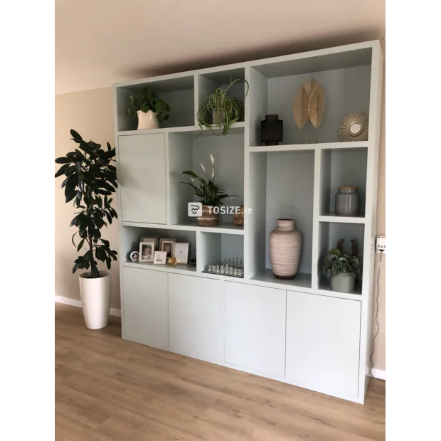 Light green cupboard wall with doors and open compartments