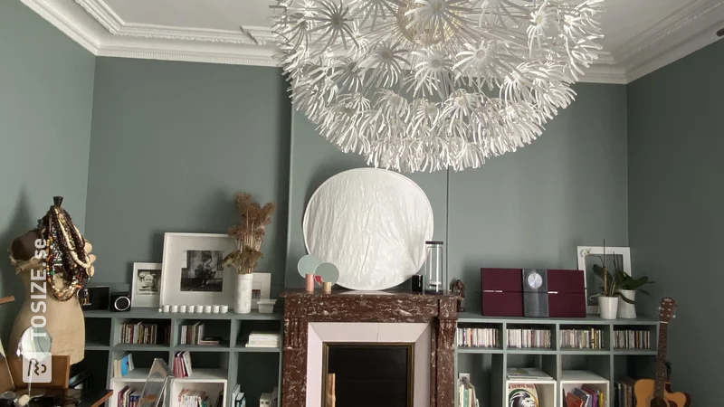 A custom-made MDF bookcase for the side of the fireplace, by Catherine