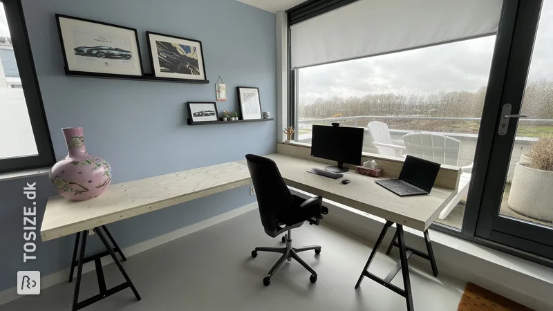 A large homemade corner desk from Pellos underlayment, by David