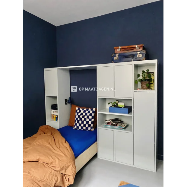 Light (wood) cupboard wall with doors and open compartments