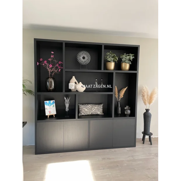 Black cupboard wall with doors and open compartments