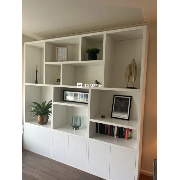 White cupboard wall with open compartments and doors