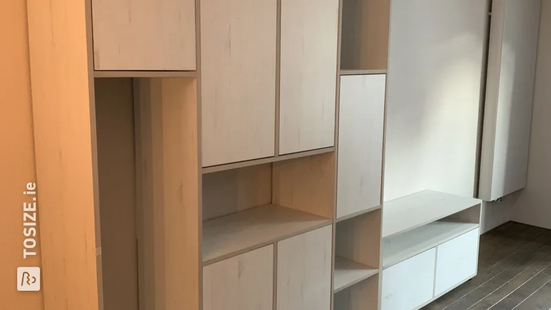 Homemade, large storage cupboard from furniture panel for the living room, by Henri