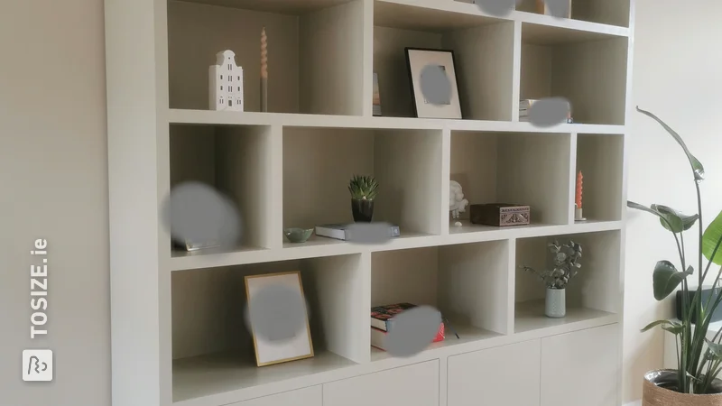 Beautiful symmetrical MDF shelving unit for the living room, by Xander