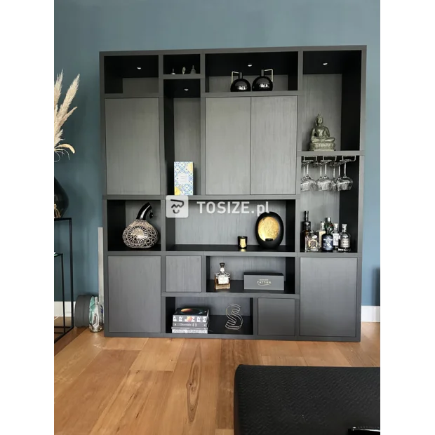 Black cupboard wall with doors and open compartments