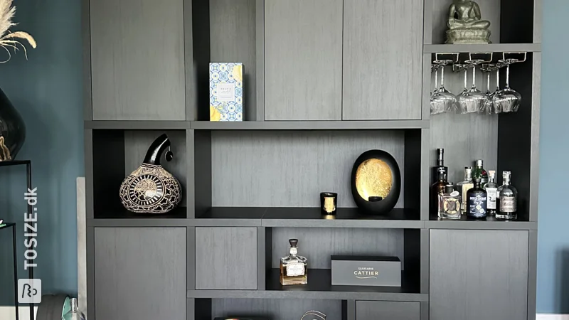 A large TOSIZE Furniture custom dream cupboard in black oak, by Sander