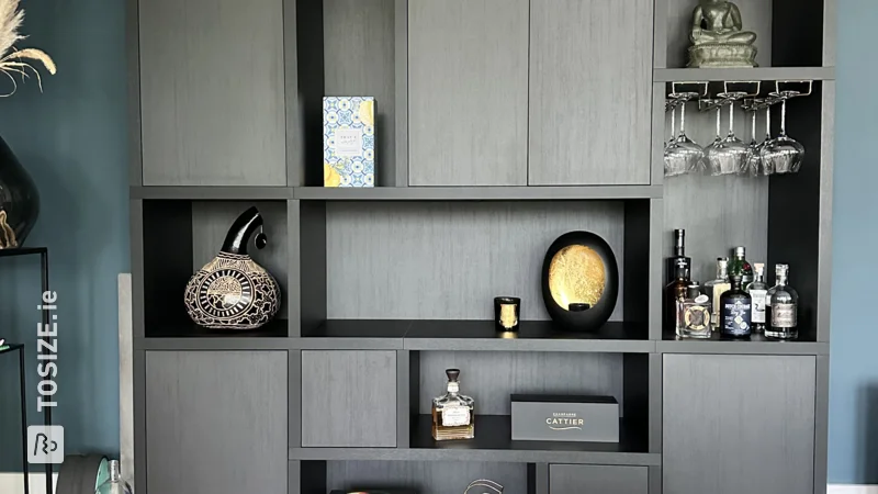 A large TOSIZE Furniture custom dream cupboard in black oak, by Sander