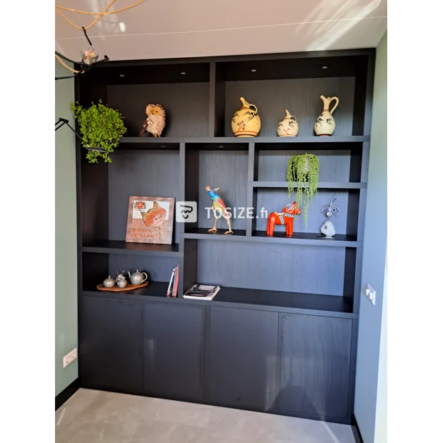 Black cupboard wall with open compartments and doors