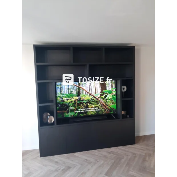 Black cupboard wall with doors and open compartments