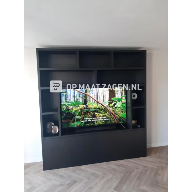 Black cupboard wall with doors and open compartments