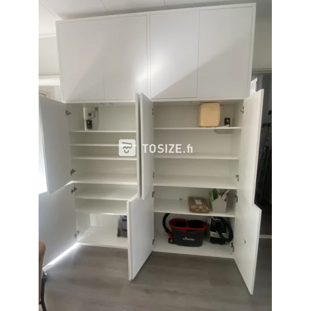 White cabinet with doors and open compartments