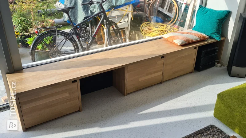 Homemade seating and storage furniture made of oak, by Niels