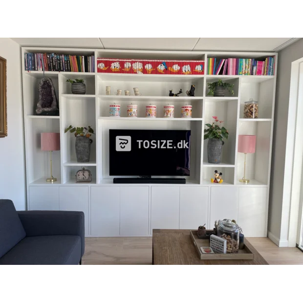 White cupboard wall with open compartments and doors