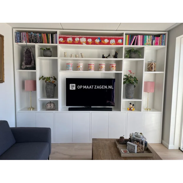 White cupboard wall with open compartments and doors