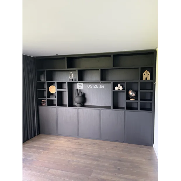 Black cupboard wall with doors and open compartments