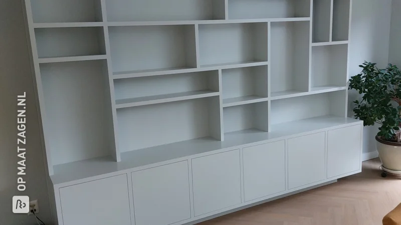 A TOSIZE furniture shelving unit with different depths, by Ruud