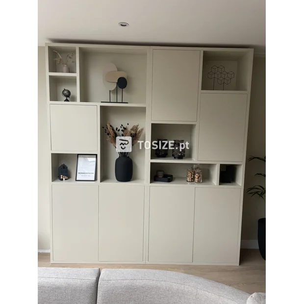 Cream cupboard wall with doors and open compartments