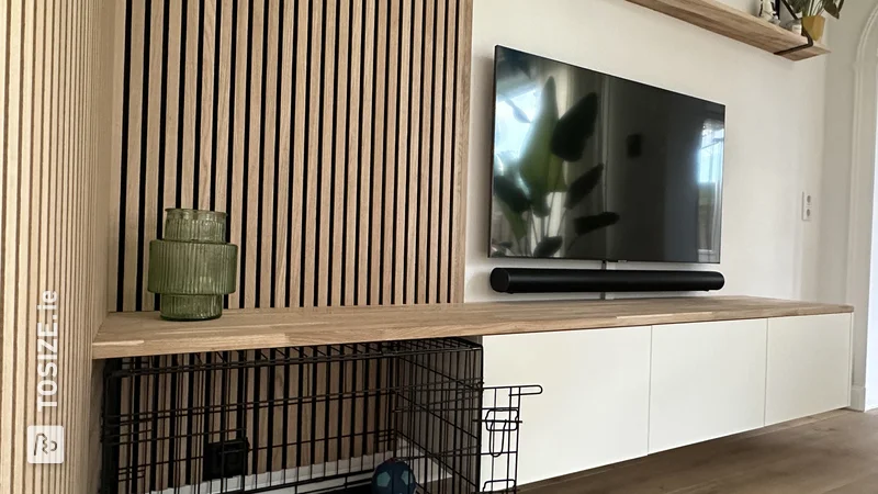 IKEA BESTA TV cabinet with oak overlap panel for dog crate, by Roel