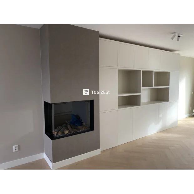 White cupboard wall with doors and open compartments