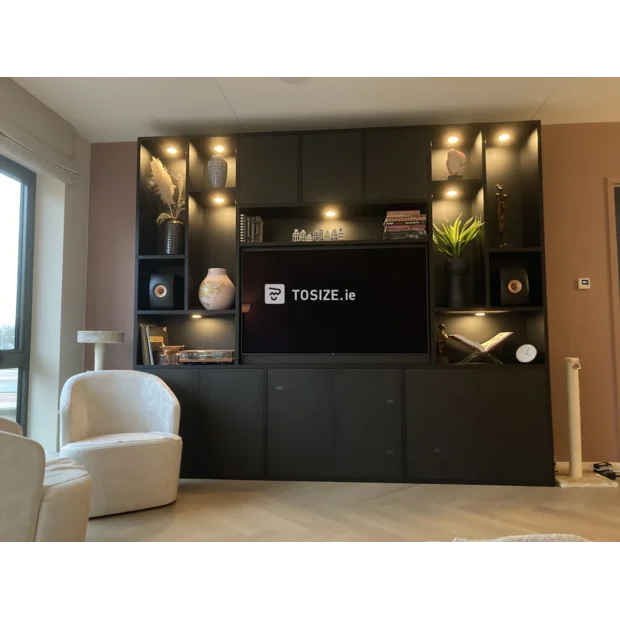 Black cupboard wall with doors and open compartments