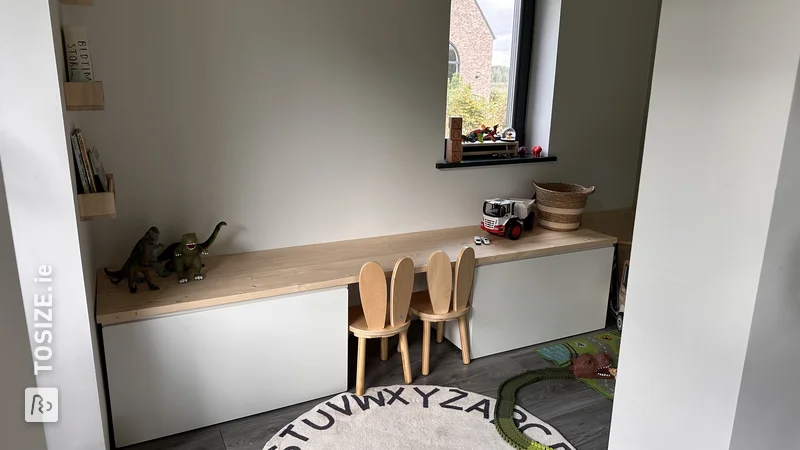 A homemade toddler desk with custom pine wood panel, by Sylvia