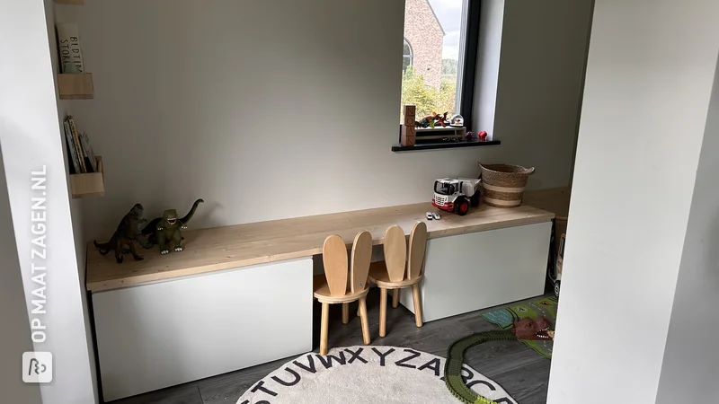 A homemade toddler desk with custom pine wood panel, by Sylvia 