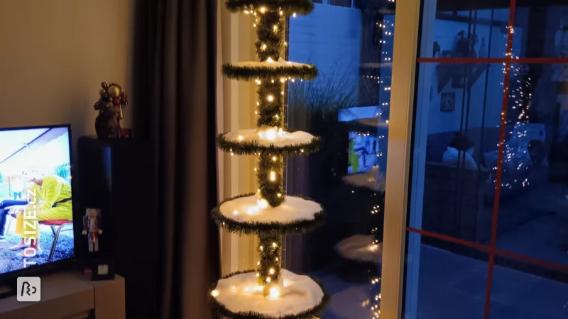 A custom Christmas tree etagere made of custom plywood circles, by Fien