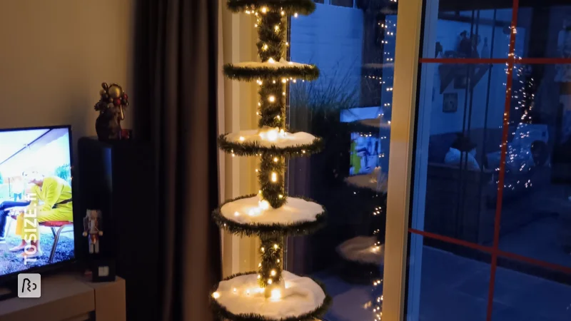 A custom Christmas tree etagere made of custom plywood circles, by Fien