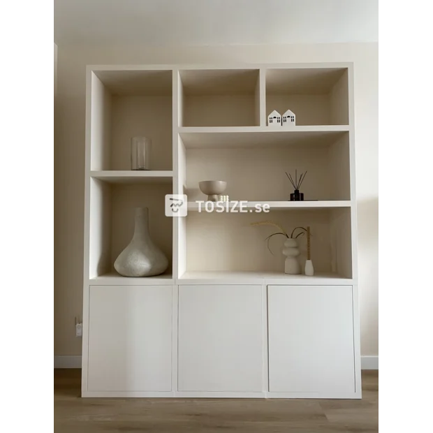 Cream cupboard wall with open compartments and doors