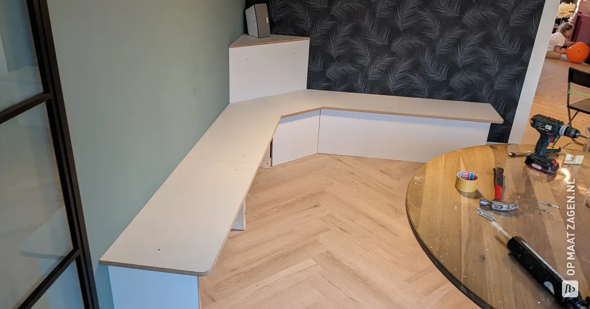 Homemade corner sofa in the dining area from custom-sawn MDF lacquer ...