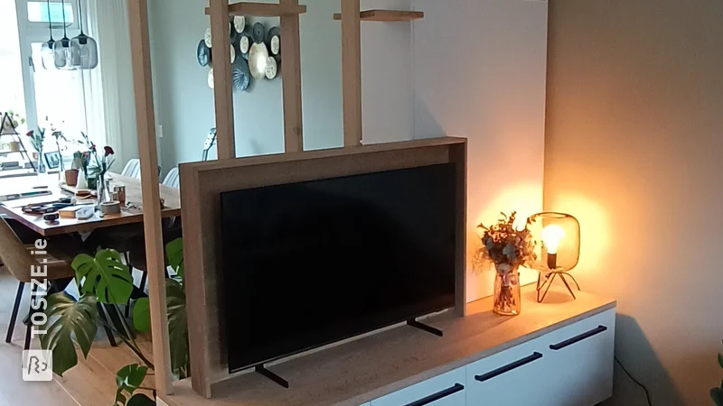 A homemade room divider including TV cabinet and cupboard, by Daniel