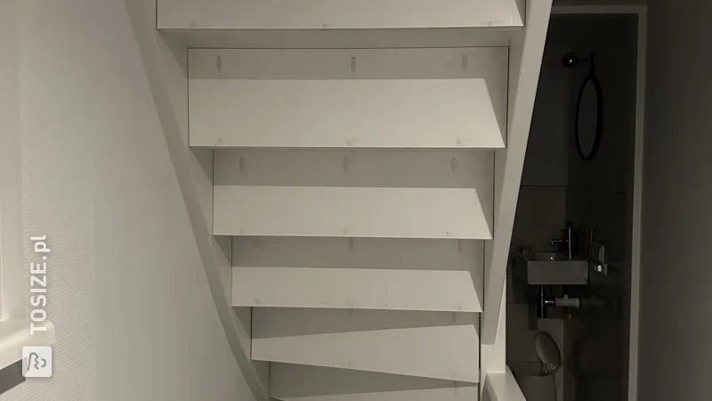 Close an open staircase yourself with custom plywood panels, by Iris 