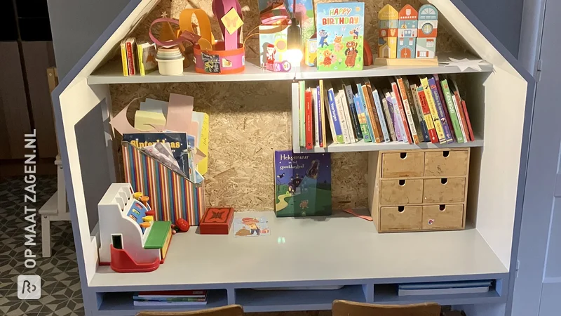 A homemade children's desk and playhouse from MDF, by Maarten