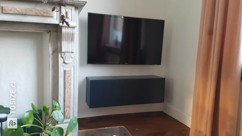 A floating TV cabinet made of blue colored MDF, by Freya