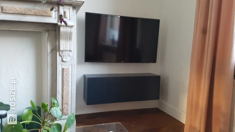 A floating TV cabinet made of blue colored MDF, by Freya