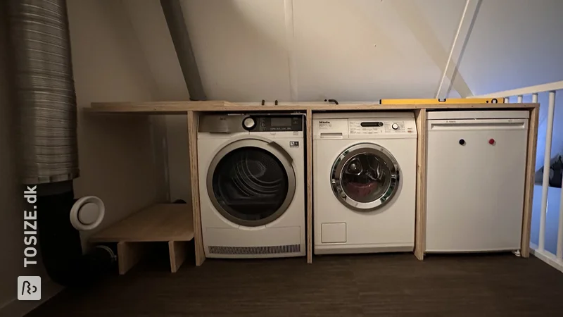 A homemade laundry room with custom plywood, by Helma