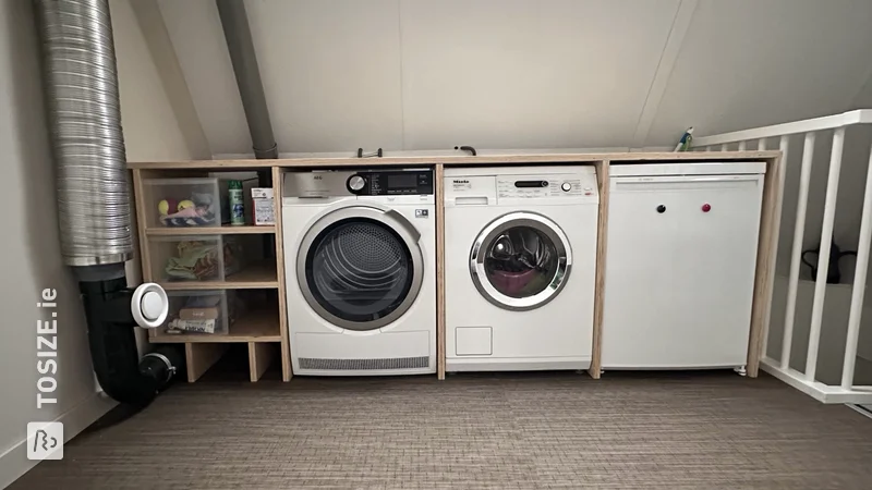A homemade laundry room with custom plywood, by Helma
