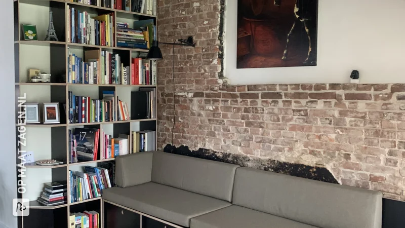 Homemade bookcase and reading bench from custom-sawn brown concrete plywood, by JT