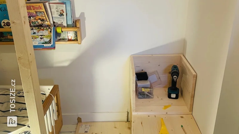 A homemade block staircase with storage space for a loft bed, by Fenna