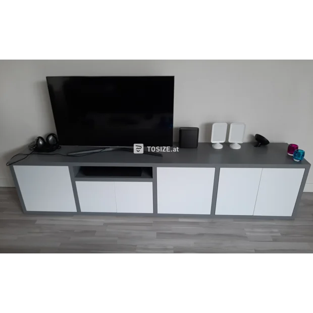 White TV cabinet with open compartments and doors