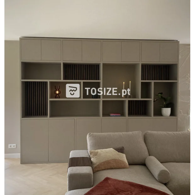 Beige cupboard wall with open compartments and doors