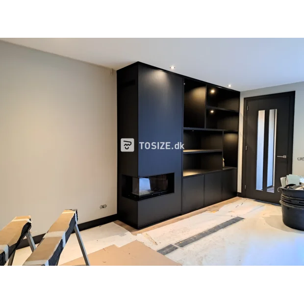 Black cupboard wall with open compartments and doors