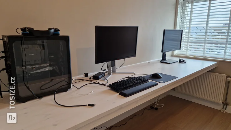 Homemade floating desk from custom sawn pine carpentry panel, by Giel