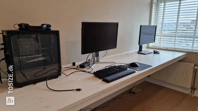 Homemade floating desk from custom sawn pine carpentry panel, by Giel