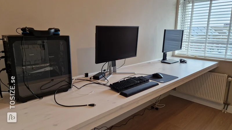 Homemade floating desk from custom sawn pine carpentry panel, by Giel