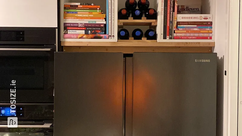 Shelf above American refrigerator made of custom sawn oak wood panel, by Walter