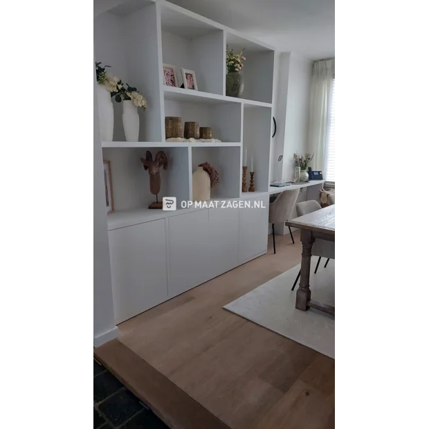 White cupboard wall with open compartments and doors